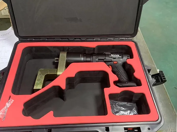 An electric torque wrench in a tool box An electric torque wrench in a tool box