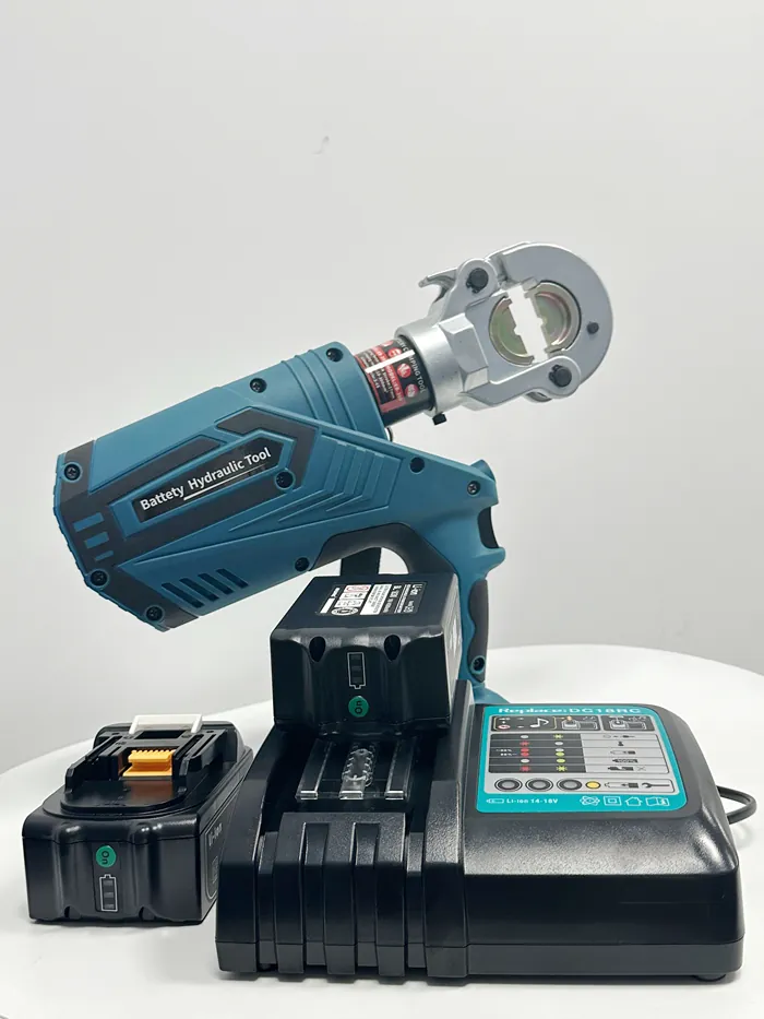 An ED300 series Battery Powered Crimp Tools and charger An ED300 series Battery Powered Crimp Tools and charger